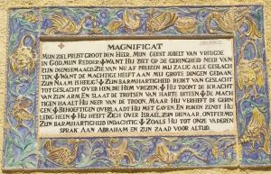 One of the many plaques with the text of the Magnificat, this one in Dutch, in the Church of the Visitation.