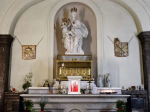 The statue of Our Lady of Basse-Wavre with the reliquary containing a number of relics of saints from the catacombs to the present day.